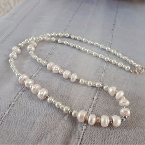 Fresh Water Pearls in white color and round shape